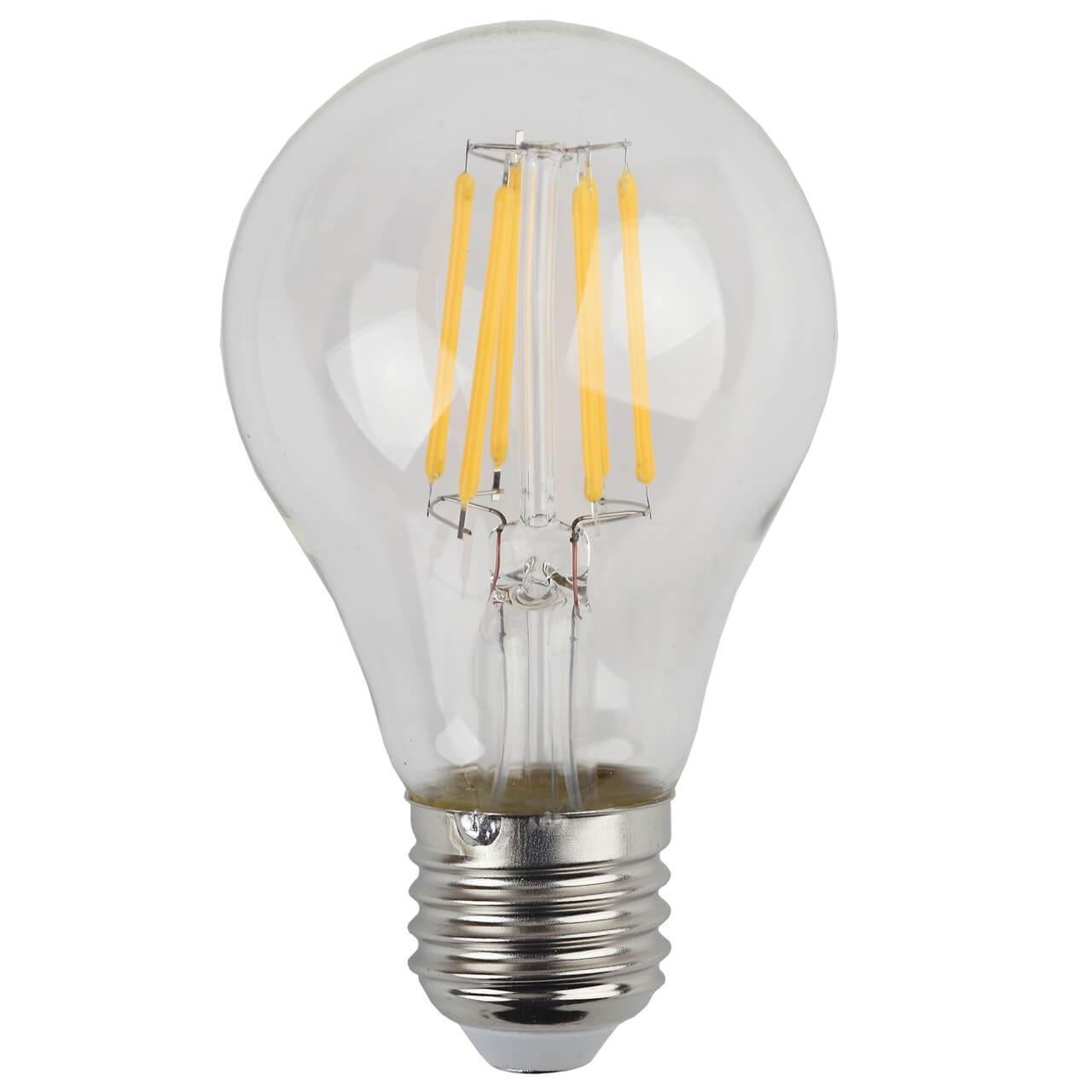 Лампа светодиодная филаментная ЭРА E27 7W 2700K груша прозрачная F-LED A60-7W-827-E27. 