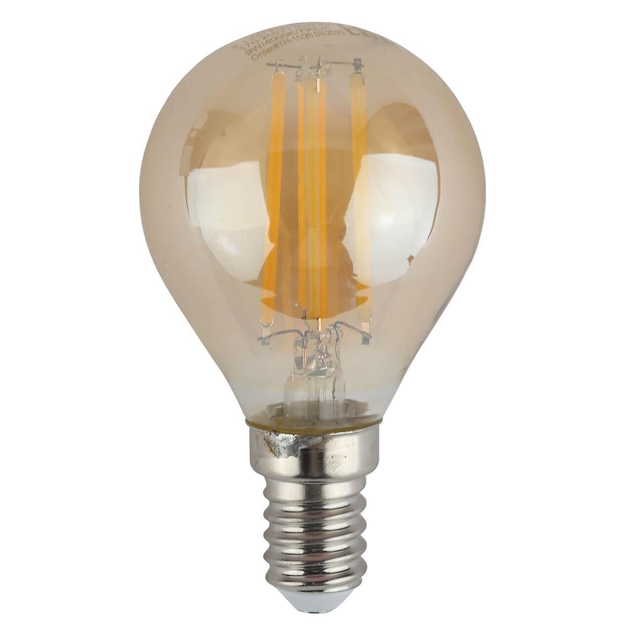 Лампа светодиодная филаментная ЭРА E14 9W 4000K золотая F-LED P45-9w-840-E14 gold Б0047028. 